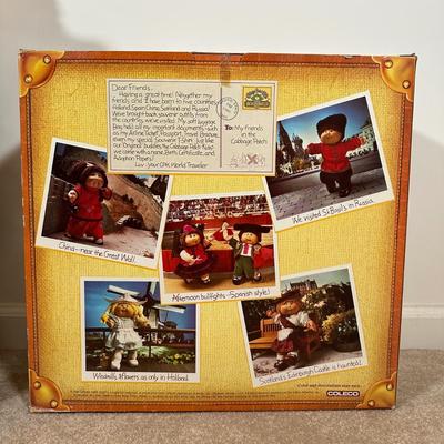LOT 164: Cabbage Patch Kids Collection - World Traveler, Growing Hair & Young Astronaut in Box