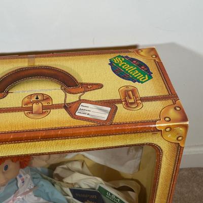 LOT 164: Cabbage Patch Kids Collection - World Traveler, Growing Hair & Young Astronaut in Box