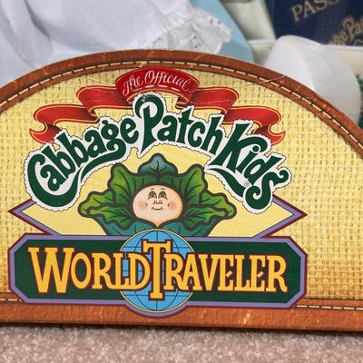 LOT 164: Cabbage Patch Kids Collection - World Traveler, Growing Hair & Young Astronaut in Box