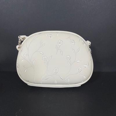 LOT 273: Anne Klein Perfume, Ralph Lauren Crossbody Clutch, Porcelain Music box, Lip Stick/Coin Purse & More