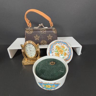 LOT 273: Anne Klein Perfume, Ralph Lauren Crossbody Clutch, Porcelain Music box, Lip Stick/Coin Purse & More