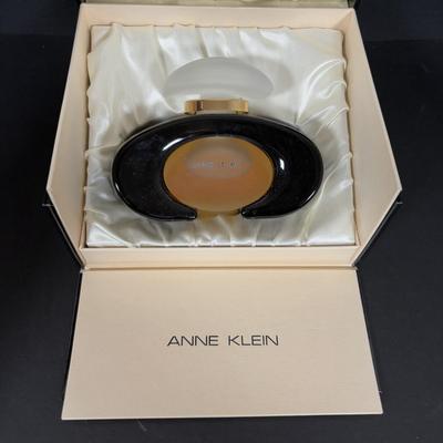 LOT 273: Anne Klein Perfume, Ralph Lauren Crossbody Clutch, Porcelain Music box, Lip Stick/Coin Purse & More