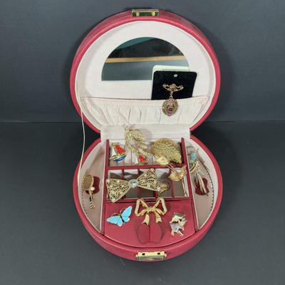 LOT 274: Jewelry Case and Brooch Collection