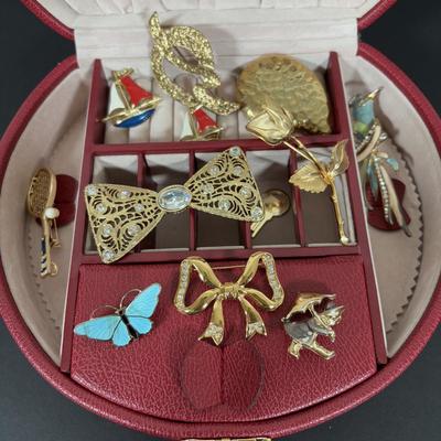 LOT 274: Jewelry Case and Brooch Collection