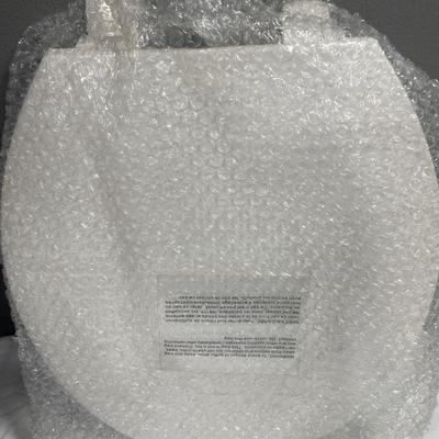 New plastic toilet seat
