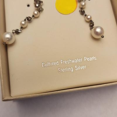 Dangling freshwater pearl earrings