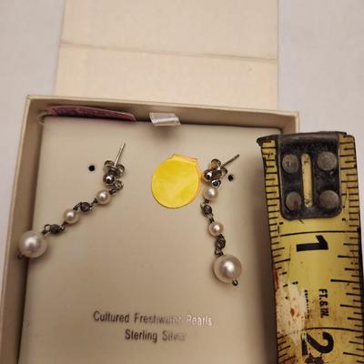 Dangling freshwater pearl earrings