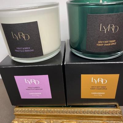 Two 3 wick Candles