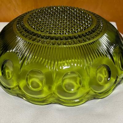 Green glass bowls with scalloped edges