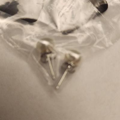 Multi colored pearl strand 16 inches with white stud earrings.