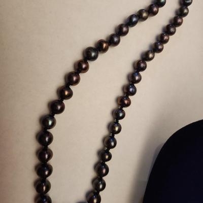 Black iridescent cultured freshwater pearl necklace.