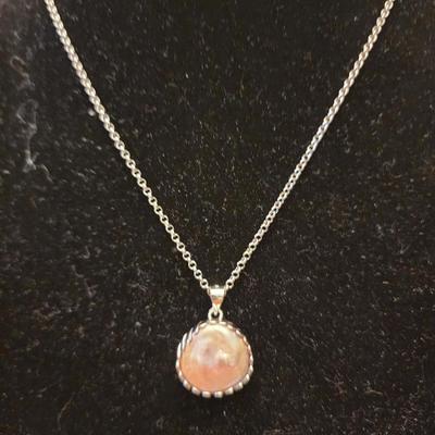 Pink cultured pearl pendant.