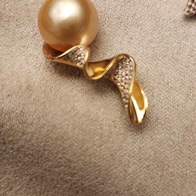Gold cultured sea pearl pendant