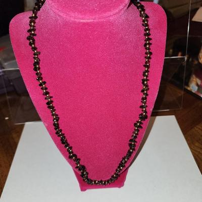Black and gold stone necklace.