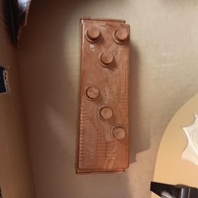1955 CHILD'S GENE AUTRY BAKELITE GUITAR WITH RAISED DECORATION ON FACE