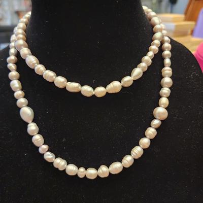 Silver toned cultured pearl necklace and bracelet