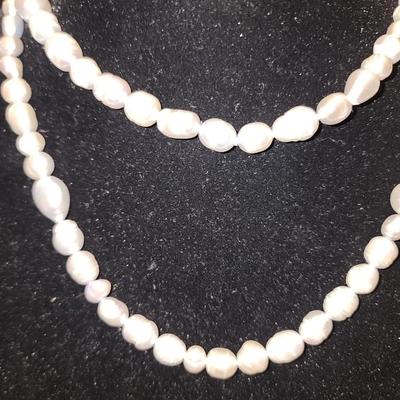 Silver toned cultured pearl necklace and bracelet