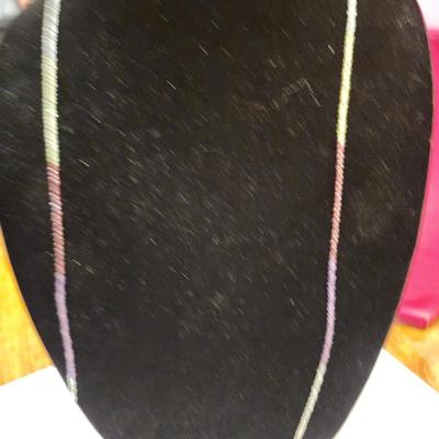 Green and purple chain beads with pearl ends.