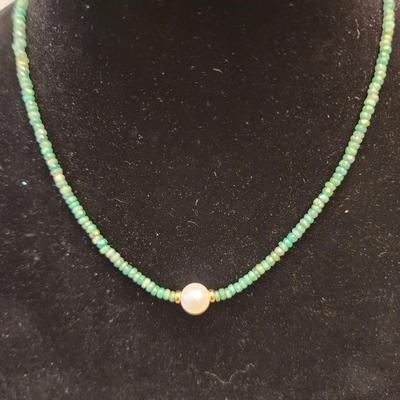 Cultured pearl pendant necklace with green beaded chain