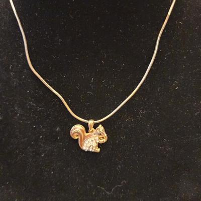 Squirrel necklace.