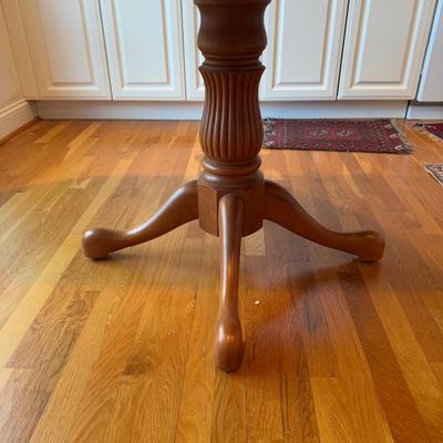 Sale Photo Thumbnail #141: Kitchen Table 
Table- 42” Diameter with two 12". leaves