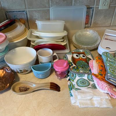 Tupperware with miscellaneous kitchen items