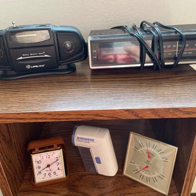 Small end table with clocks