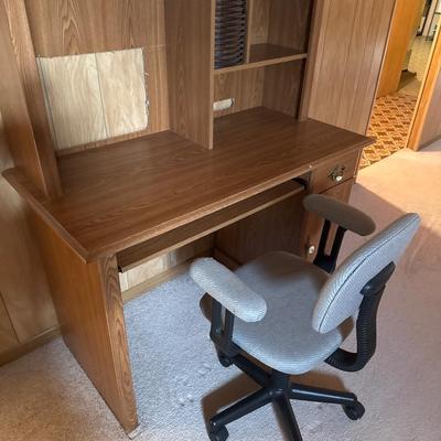 Desk with office chair.