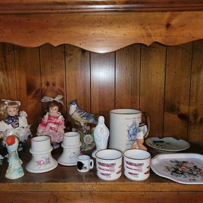 Collection of ceramics in a vintage Samsonite carry on bag