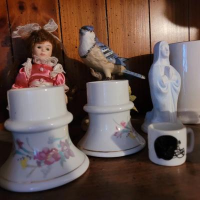 Collection of ceramics in a vintage Samsonite carry on bag