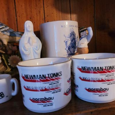 Collection of ceramics in a vintage Samsonite carry on bag