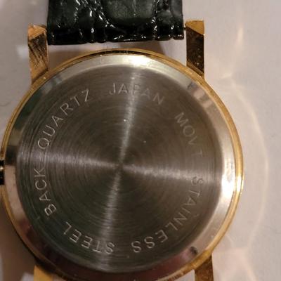 2 diamond quartz watches