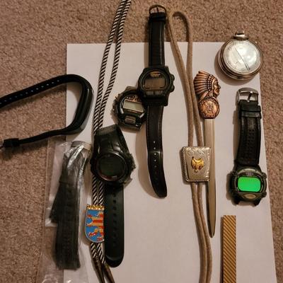 Collection of watches, bolo ties letter opener
