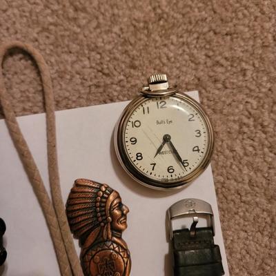 Collection of watches, bolo ties letter opener