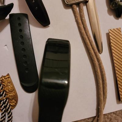 Collection of watches, bolo ties letter opener