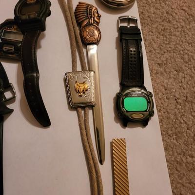 Collection of watches, bolo ties letter opener