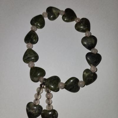 Green heart bracelet.