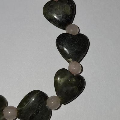 Green heart bracelet.