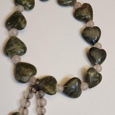 Green heart bracelet.