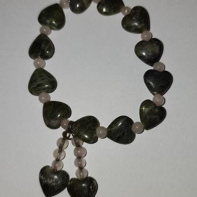 Green heart bracelet.
