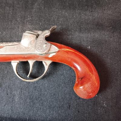 HUBLEY FLINTLOCK JR W/BAKELITE STOCK AND 2 OTHER TOY GUNS