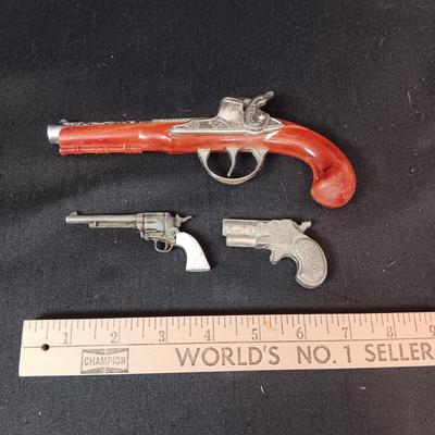 HUBLEY FLINTLOCK JR W/BAKELITE STOCK AND 2 OTHER TOY GUNS