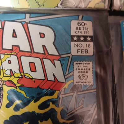 4 COMIC BOOKS IN PROTECTIVE SLEEVES