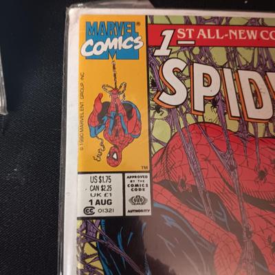 4 COMIC BOOKS IN PROTECTIVE SLEEVES