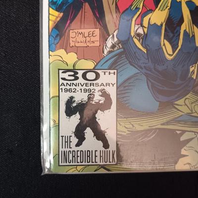 4 COMIC BOOKS IN PROTECTIVE SLEEVES