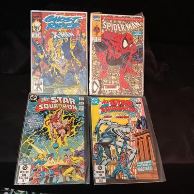4 COMIC BOOKS IN PROTECTIVE SLEEVES