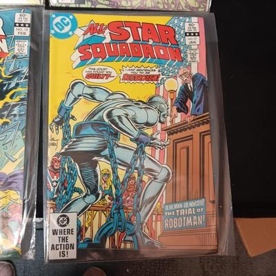 4 COMIC BOOKS IN PROTECTIVE SLEEVES