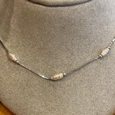Silver tone necklaces