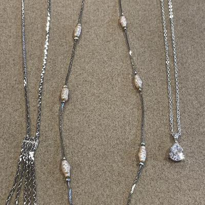 Silver tone necklaces