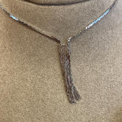 Silver tone necklaces